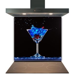 A vibrant blue cocktail with splashes against a dark background on a glossy, heat-resistant Kitchen Glass Splashback Toughened & Heat Resistant - Design No. 2021, displayed on a large vertical screen above a kitchen cooktop.