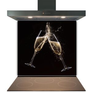 An induction stove with an overhead exhaust hood displaying an image of two champagne glasses in a toast with liquid splashing out on a Kitchen Glass Splashback Toughened & Heat Resistant - Design No. 2031.