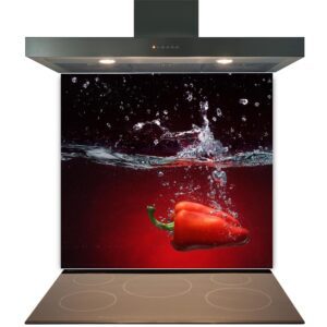 Modern range hood above an induction stove with an artistic backdrop of a red bell pepper splashing into water, available as a Shop Single Print Template.