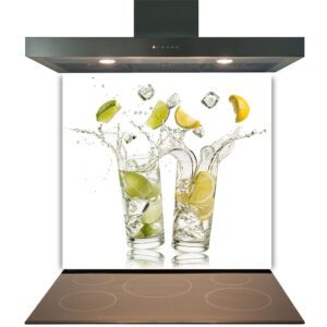 Two glasses with citrus fruits splashing into water on a Kitchen Glass Splashback Toughened & Heat Resistant - Design No. 2041 under a range hood.